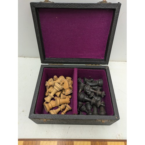 493 - A Leather Covered Box Containing A Set Of Wood Turned Chess Pieces, And A Light Wood Chess Board - C... 