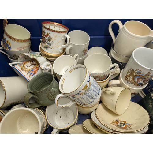 523 - a large collection of Royal commemorative crockery including cups, mugs and plates