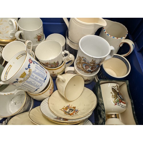 523 - a large collection of Royal commemorative crockery including cups, mugs and plates