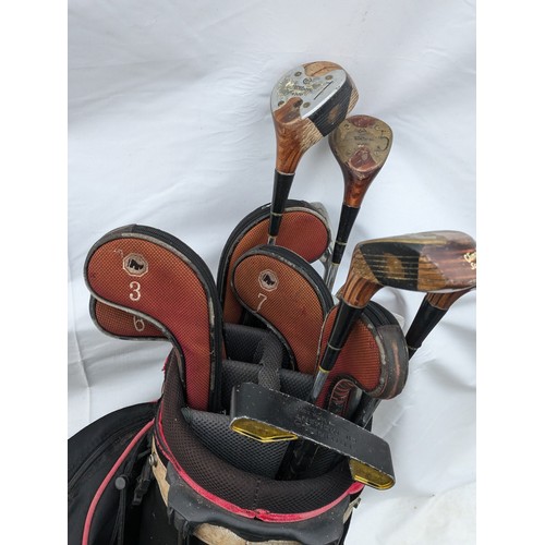 108 - a set of Wilkinson golf clubs