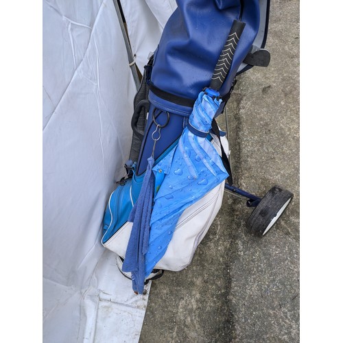 1176 - A Golf Bag Containing A Selection Of Mizuno Golf Clubs, And A Variety Of Accessories