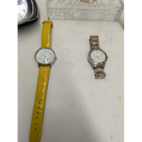 1182 - an assortment of quartz clocks and 2 wristwatches