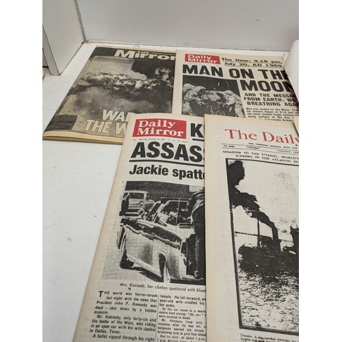 1200 - reprints of various historical headline events including VE Day, titanic, JFK assassination etc