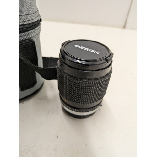 729 - An Ozeck 'Super Ozeck' Auto Tele Focus Lens In Carry Case