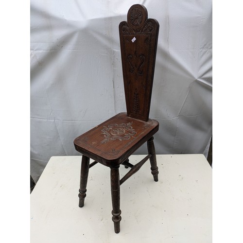 252 - An Oak Hand Carved Thin Backed Chair