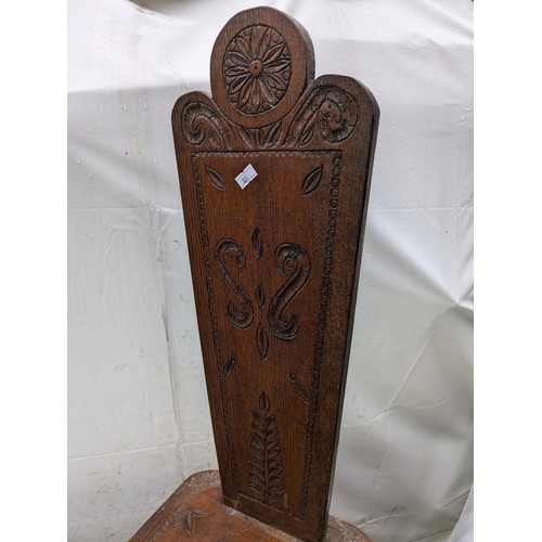 252 - An Oak Hand Carved Thin Backed Chair