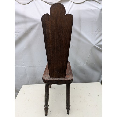 252 - An Oak Hand Carved Thin Backed Chair