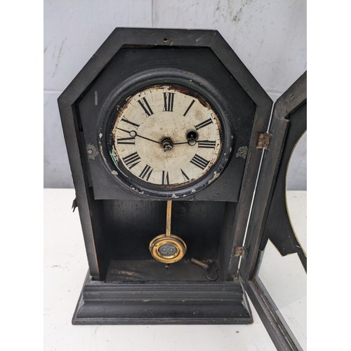 413 - A Mid 19th century Mantle Clock With Pendulum and Key