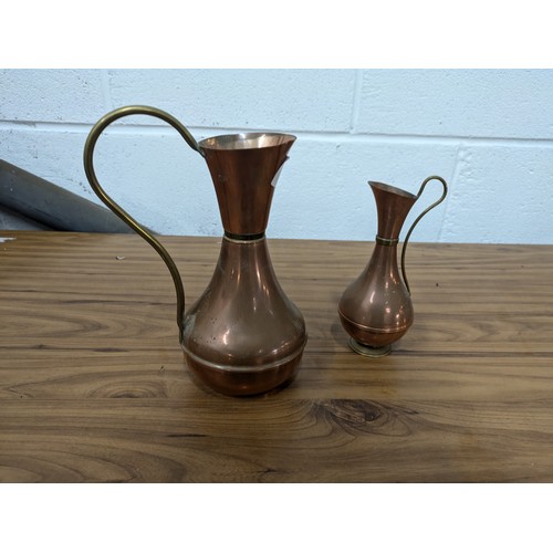 421 - A Pair of Brass and Copper Jugs