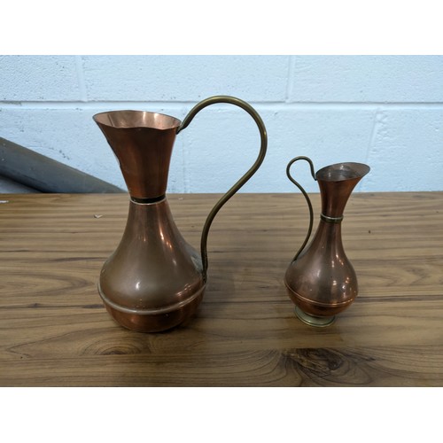 421 - A Pair of Brass and Copper Jugs