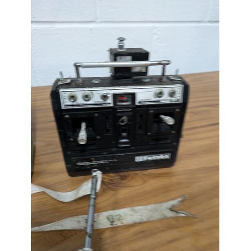 639 - A Selection of 5 RC Handheld Remotes including a Boxed Sanwa Mini Propo