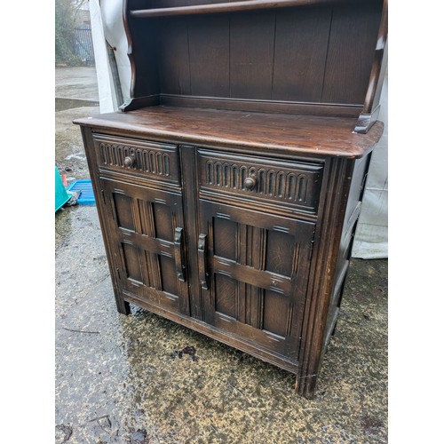 251 - A Vintage Carved Welsh Dresser with 2 Drawers and a Cupboard Space