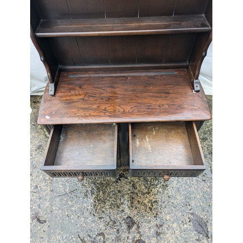 251 - A Vintage Carved Welsh Dresser with 2 Drawers and a Cupboard Space