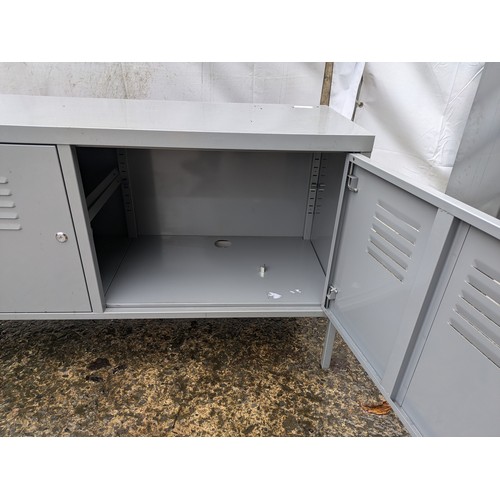 3 - A Metal Lockable Storage Cabinet in Grey With Key