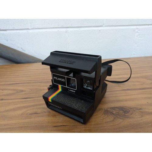 606 - A Vintage Polaroid OneStep600 Instant Camera