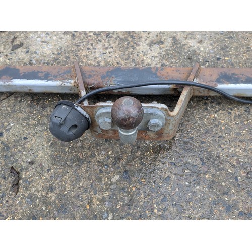 25 - A metal vehicle tow hitch