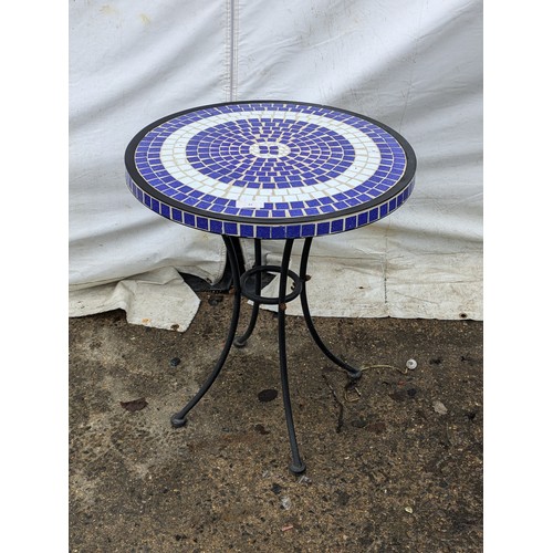 49 - A Blue And White Metal Tile Topped Table