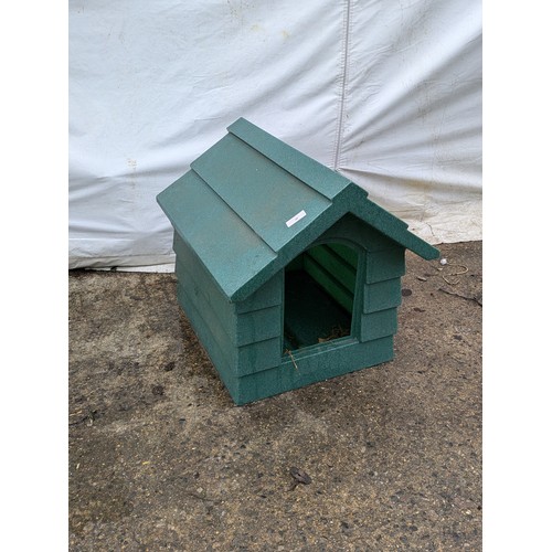 46 - A plastic green dog kennel