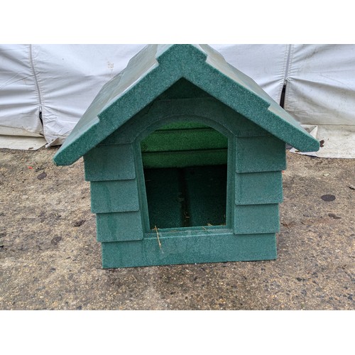 46 - A plastic green dog kennel