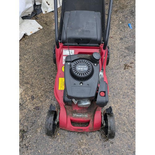 19 - A Mountfield Petrol Lawn Mower Model HP414 With a amount field RS100 100CC Engime