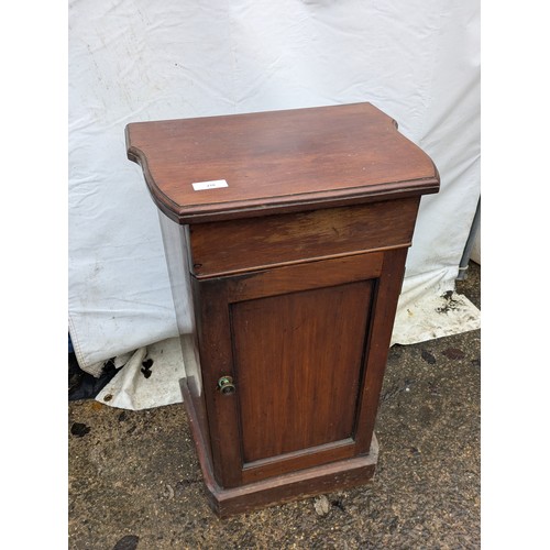 210 - A Mahogany Curvaceous Cabinet With interior Shelving