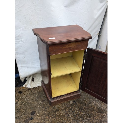 210 - A Mahogany Curvaceous Cabinet With interior Shelving