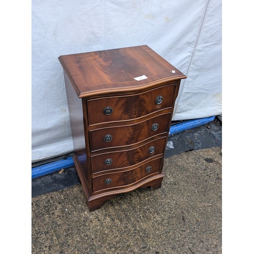 233 - A bow Fronted Walnut 4 Drawer Bedside Table