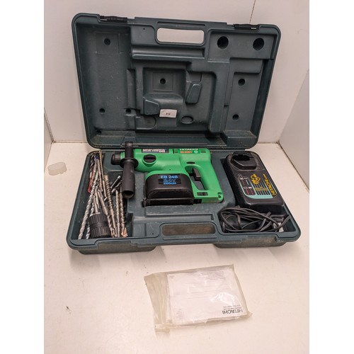 812 - A Hitachi Model DH20DV SDS Drill in Case With Battery And Charger