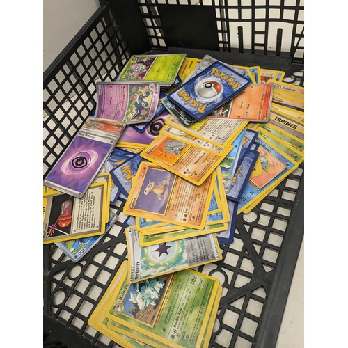 1021 - A large selection of vintage Pokemon cards and modern Pokemon cards and accessories