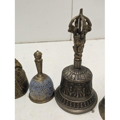 427 - A Selection of Brass Bells Depicting Women