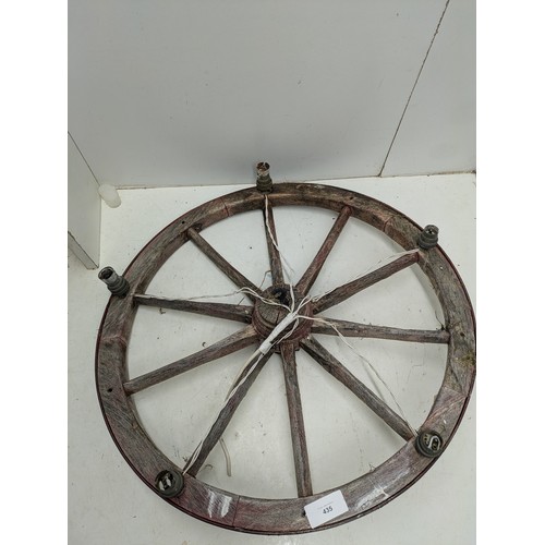 435 - An Antique Cartwheel Modified into a Chandelier