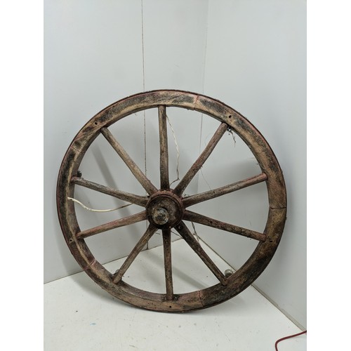 435 - An Antique Cartwheel Modified into a Chandelier