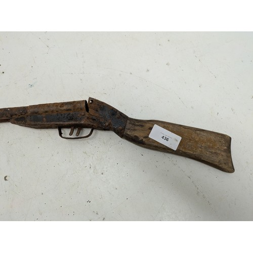 436 - A a vintage spring action double barrel toy shotgun