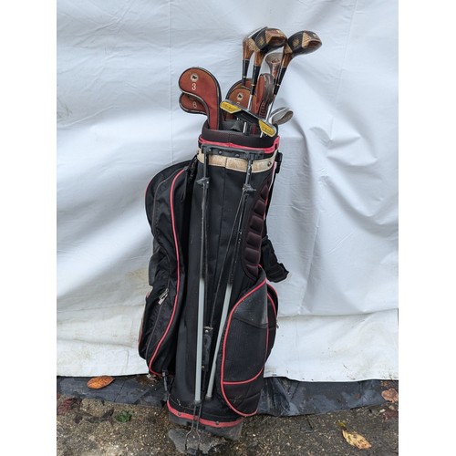 81 - a set of Wilkinson golf clubs