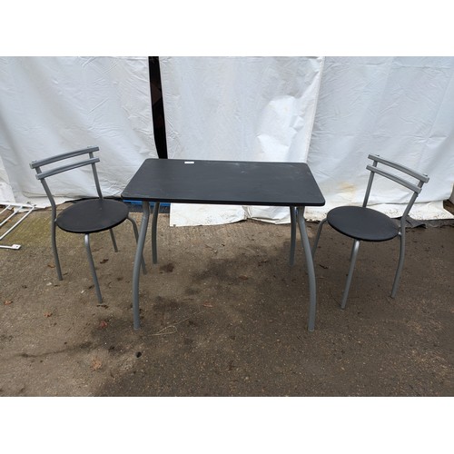 273 - a modern lightweight black topped table with 2 matching chairs