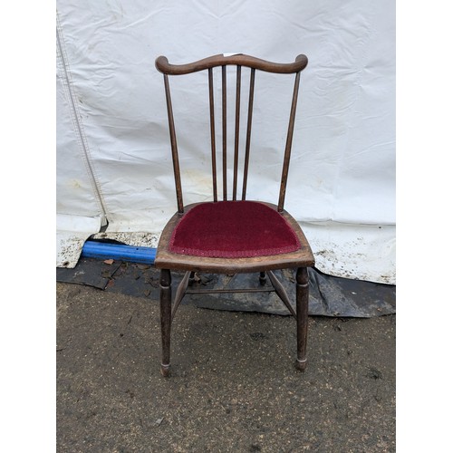 280 - an antique children's chair with an upholstered base