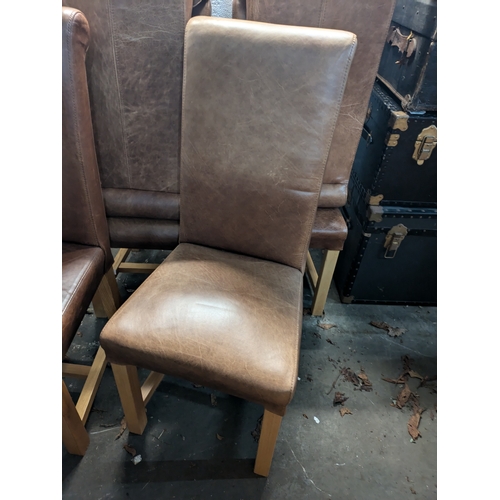 294 - A set of 6 brown leather dining chairs