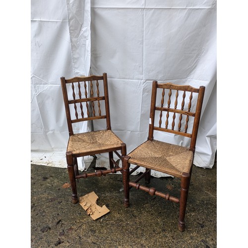 301 - A Pair of Oak Chairs With Spoked Back and Wicker Seats