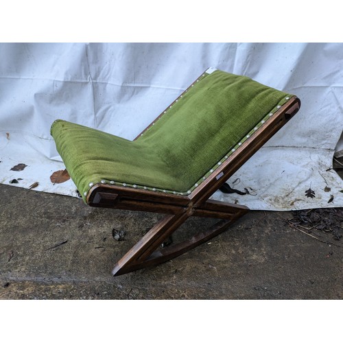 307 - An Oak Children's Rocking Chair With Green Fabric And Studded Seat Base