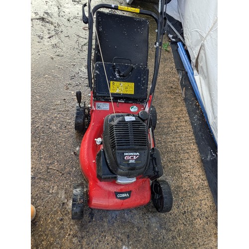 234 - A cobra petrol lawn mover with a Honda gcv135 engine