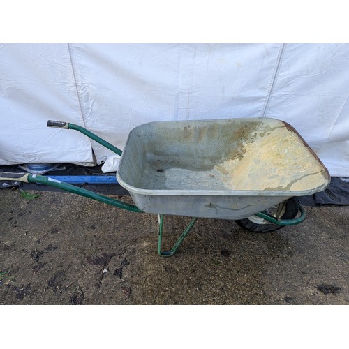 219 - A wheelbarrow with a galvanised body