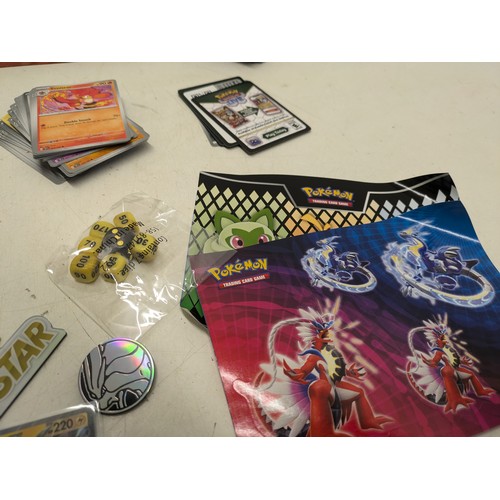 2166 - A large selection of Pokémon cards and accessories