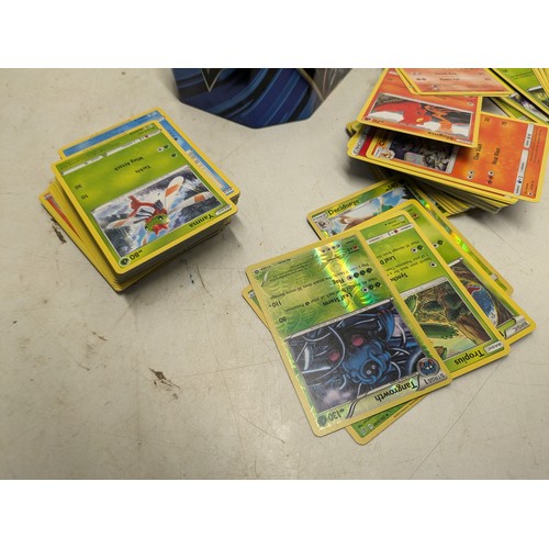 2162 - A tin of Pokémon cards