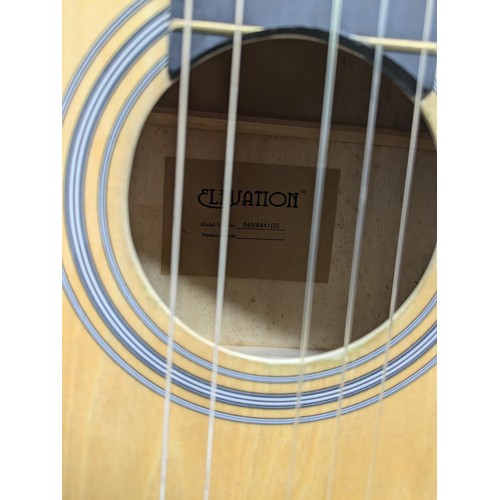 2175 - An Elevation acoustic guitar in case