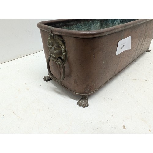 857 - An Antique Copper And Brass Plant Pot With Lion Motifs