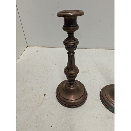 853 - A Pair of Antique Copper Candle Sticks