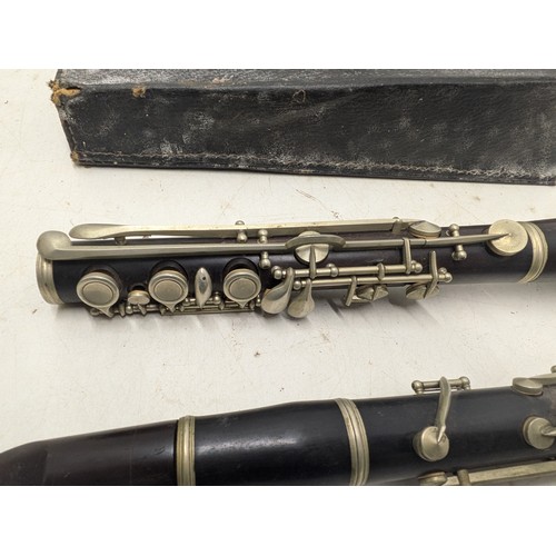 839 - A Vintage Clarinet in A Leather British Made Case