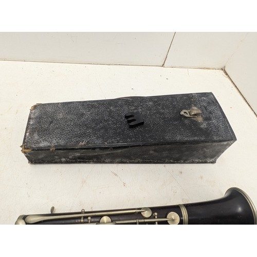 839 - A Vintage Clarinet in A Leather British Made Case