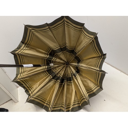 810 - A Vintage Leather Handled Umbrella