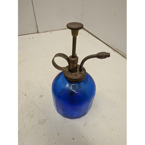 820 - A Vintage Blue Glass atomiser With a Brass Top